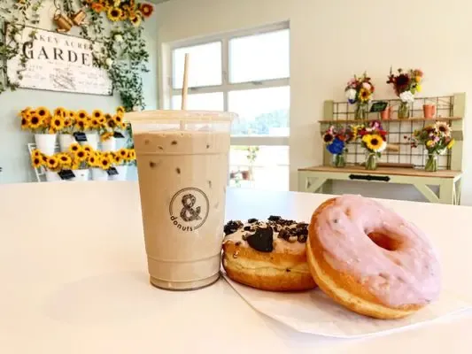 Iced latte and fresh donuts at Peace, Love & Donuts in Allyn, WA
